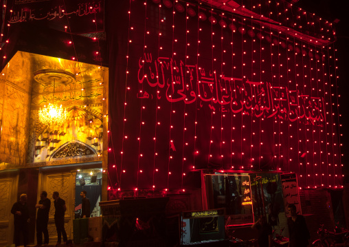 Hosseinieh of the Mad of Hussein covered with red lights for Muharram, Isfahan Province, Kashan, Iran