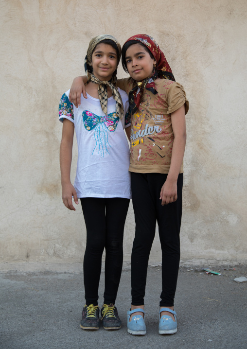 Two iranian girls with fashionnable clothes in the street, Lorestan Province, Khorramabad, Iran