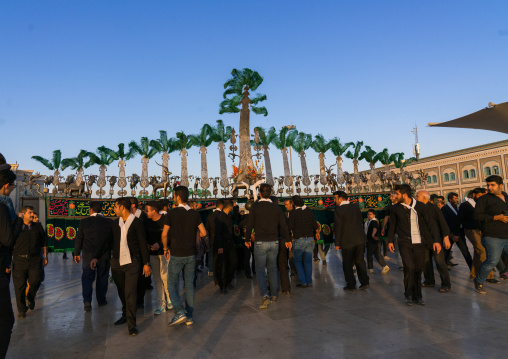 Alam procession during Muharram celebrations in Fatima al-Masumeh shrine, Central County, Qom, Iran
