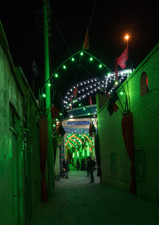 Street decorated and lighten by green lights during Muharram to commemorate the martyrdom anniversary of Hussein, Isfahan Province, Kashan, Iran