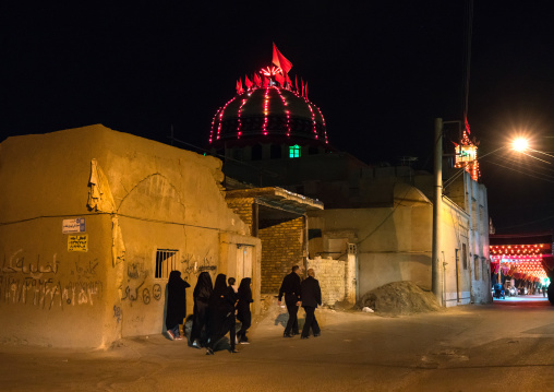 Street decorated and lighten by red lights during Muharram to commemorate the martyrdom anniversary of Hussein, Isfahan Province, Kashan, Iran