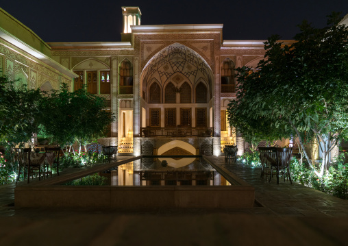 Mahinestan Raheb hotel courtyard at night, Isfahan Province, Kashan, Iran