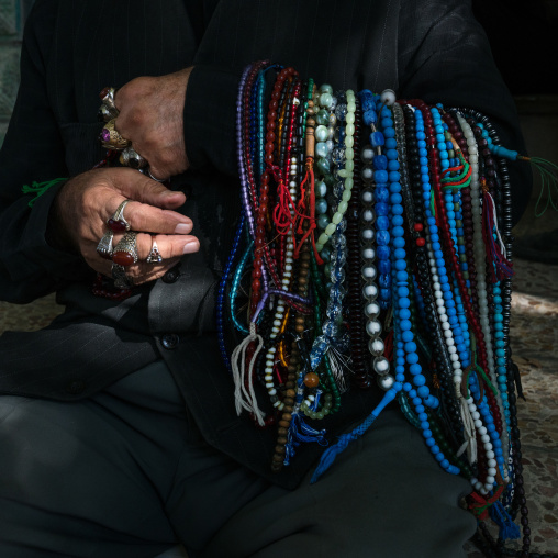 Man selling muslim prayer beads in the street for Ashura, Lorestan Province, Khorramabad, Iran