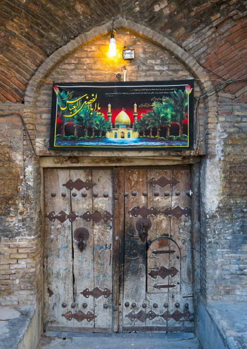 old wooden door decorated for Muharram, Lorestan Province, Khorramabad, Iran