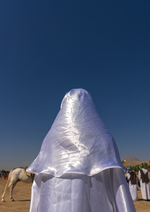 Woman in white chador during a traditional religious theatre called tazieh about Imam Hussein death in Kerbala, Lorestan Province, Khorramabad, Iran