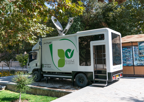 Solar energy truck to buy sim cards for mobile phones in a park, Isfahan Province, Isfahan, Iran