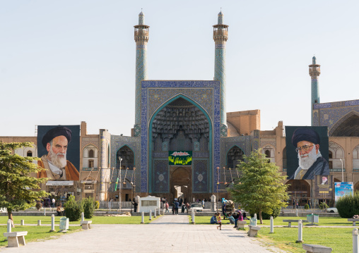 Khameini and Khomeini posters around Shah mosque on Naghsh-i Jahan square, Isfahan Province, Isfahan, Iran