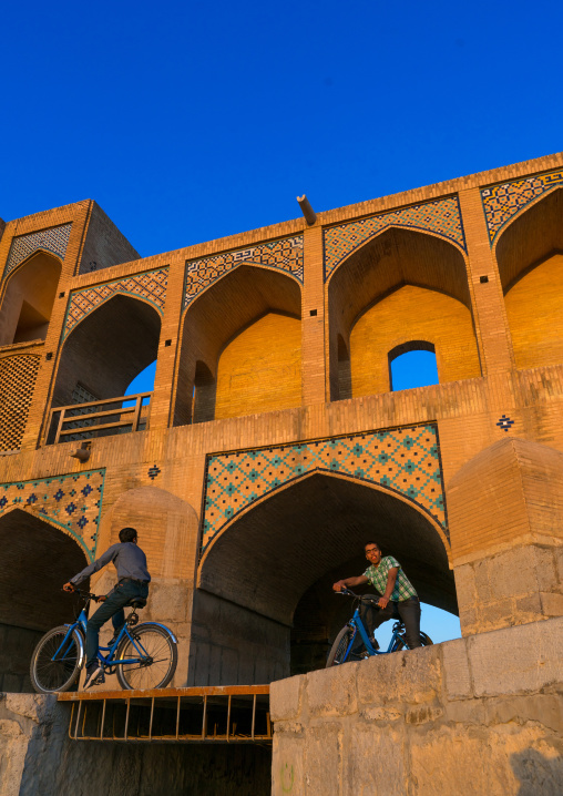Teenagers riding on Khaju bridge Pol-e Khaju, Isfahan Province, Isfahan, Iran