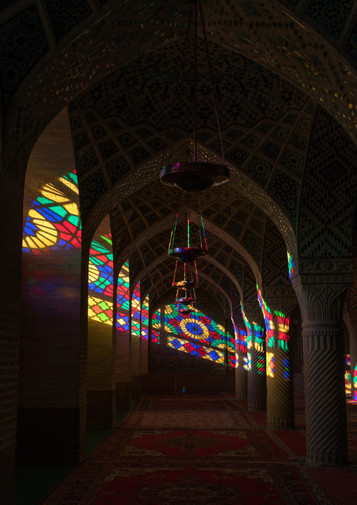 The prayer hall of Nasir ol Molk mosque with its beautiful coloured glass windows, Fars Province, Shiraz, Iran