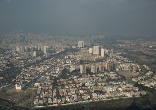 view of the city with the pollution cloud from the top of the milad tower, Central district, Tehran, Iran