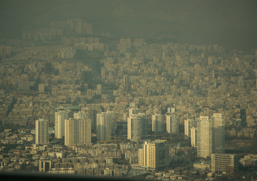view of the city with the pollution cloud from the top of the milad tower, Central district, Tehran, Iran
