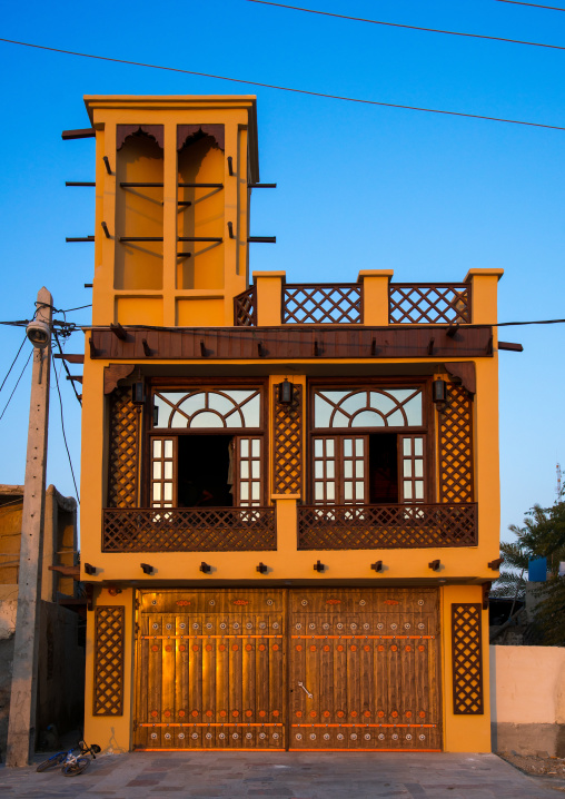 wind tower on a modern house used as a natural cooling system in iranian traditional architecture, Qeshm Island, Laft, Iran