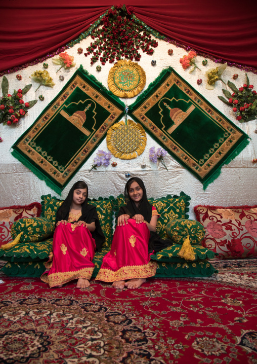 young girls in traditional clothing during a wedding ceremony, Hormozgan, Bandar-e Kong, Iran