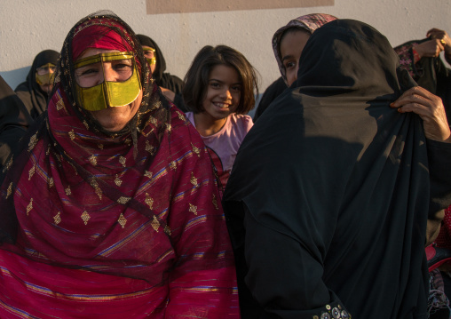 woman with a burqa mask during a wedding, Hormozgan, Kushkenar, Iran