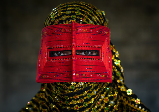 a bandari woman wearing a traditional mask called the burqa, Hormozgan, Minab, Iran