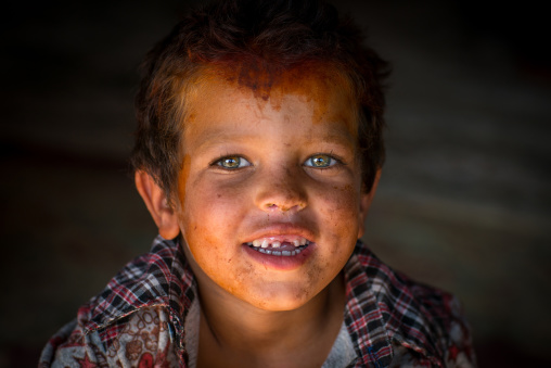gypsy boy with rd hair and beautiful eyes, Central County, Kerman, Iran
