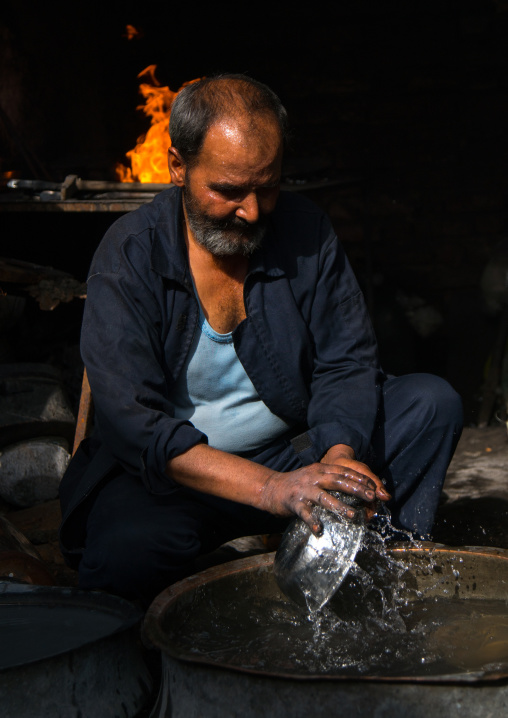 coppersmith in ganjali bazaar, Central County, Kerman, Iran