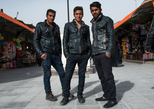portrait of iranian men with leather jackets in ganjali bazaar, Central County, Kerman, Iran