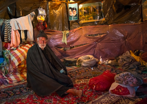 old man in his troglodyte house, Kerman province, Meymand, Iran
