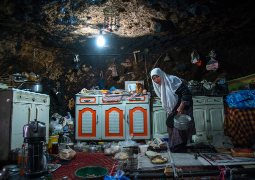 old widow woman in her troglodyte house, Kerman province, Meymand, Iran