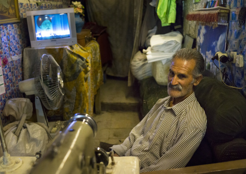 Man Watching Television In The Bazaar, Kermanshah, Iran