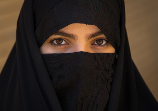 A Shiite Muslim Woman Wearing A Niqab Mourning Imam Hussein On The Day Of Tasua, Lorestan Province, Khorramabad, Iran