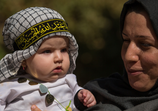 An Iranian Shiite Mother And Her Child During Tasua Celebrations One Day Before Ashura, Lorestan Province, Khorramabad, Iran