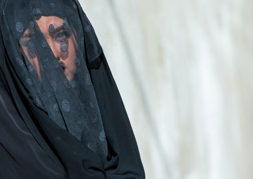 Iranian Shiite Muslim Woman Mourning Imam Hussein On The Day Of Tasua With Her Face Covered By A Veil, Lorestan Province, Khorramabad, Iran