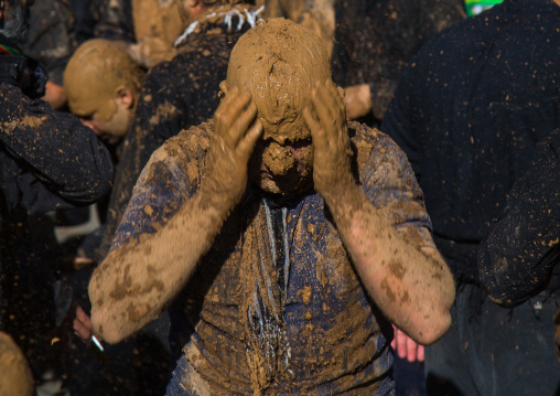Iranian Shiite Muslim Man Covered In Mud Crying During Ashura Day, Kurdistan Province, Bijar, Iran