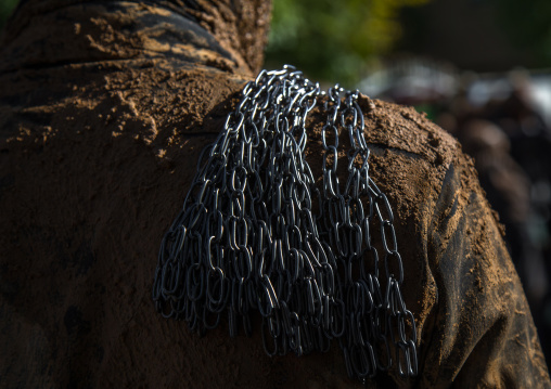 Iranian Shiite Man Covered In Mud With Iron Chains To Commemorate Ashura, The Day Of The Death Of Imam Hussein, Kurdistan Province, Bijar, Iran