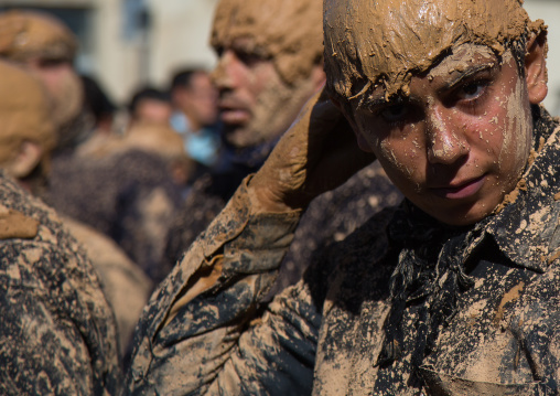 Iranian Shiite Muslim Teenage Boy Covered In Mud During Ashura Day, Kurdistan Province, Bijar, Iran