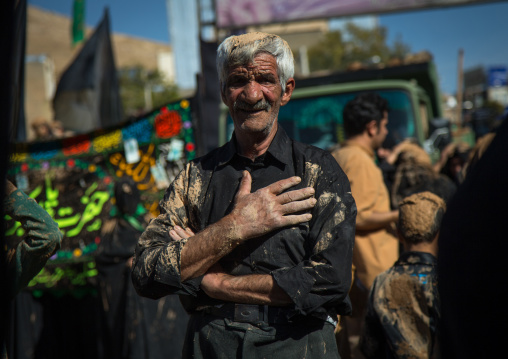 Iranian Shiite Muslim Old Man Covered In Mud, Chanting And Self-flagellating During Ashura Day, Kurdistan Province, Bijar, Iran