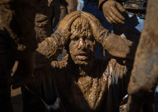 Iranian Shiite Muslim Man Covered In Mud, Chanting And Self-flagellating During Ashura Day, Kurdistan Province, Bijar, Iran