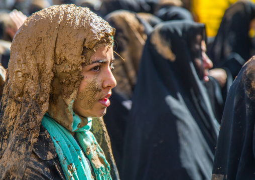 Iranian Shiite Muslim Young Woman Covered In Mud During Ashura, The Day Of The Death Of Imam Hussein, Kurdistan Province, Bijar, Iran