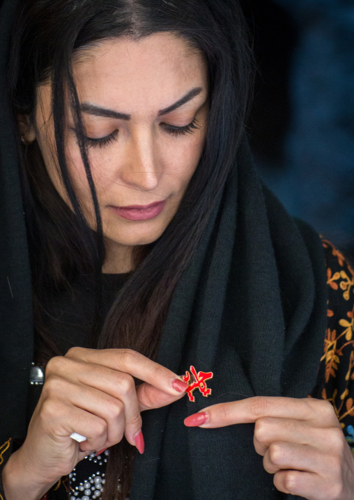 Portrait Of An Iranian Beauty Putting An Iman Hussein Badge, Yazd Province, Yazd, Iran