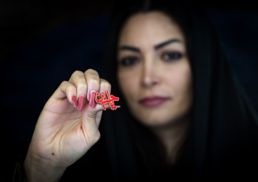 Iranian Woman Showing An Iman Hussein Badge, Yazd Province, Yazd, Iran