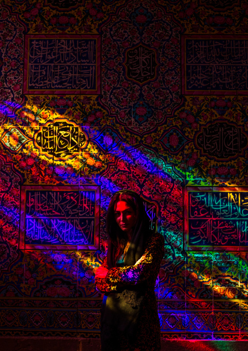 Iranian Woman In The Nasir Ol Molk Mosque With Its Beautiful Coloured Glass Windows, Fars Province, Shiraz, Iran