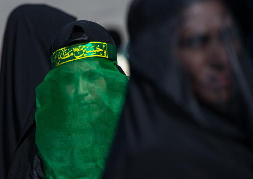 Iranian Shiite Muslim Women Mourning Imam Hussein On The Day Of Tasua With Their Faces Covered By A Veil, Lorestan Province, Khorramabad, Iran