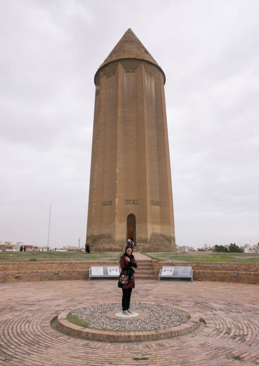 Iranian Woman Standing On The Circle Where You Can Hear Your Echo Bouncing Back, Gonbad-e Kavus, The Tower Of Kavus, Golestan Province, Gonbad-e Qabus, Iran
