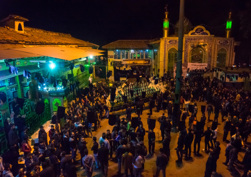 Iranian Shiite Muslim Men Mourners With An Alam In A Mosque Courtyard On Ashura, The Day Of The Death Of Imam Hussein, Golestan Province, Gorgan, Iran
