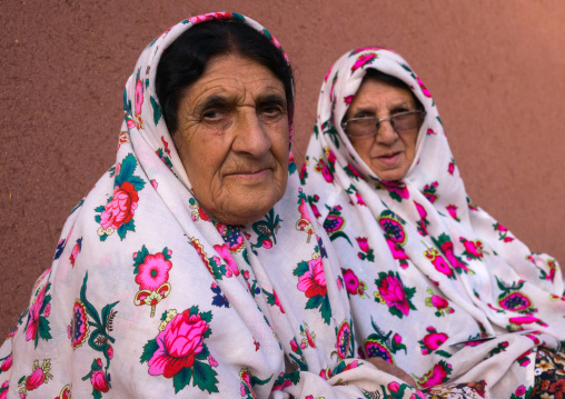 Portrait Of Iranian Women Wearing Traditional Floreal Chadors In Zoroastrian Village, Isfahan Province, Abyaneh, Iran