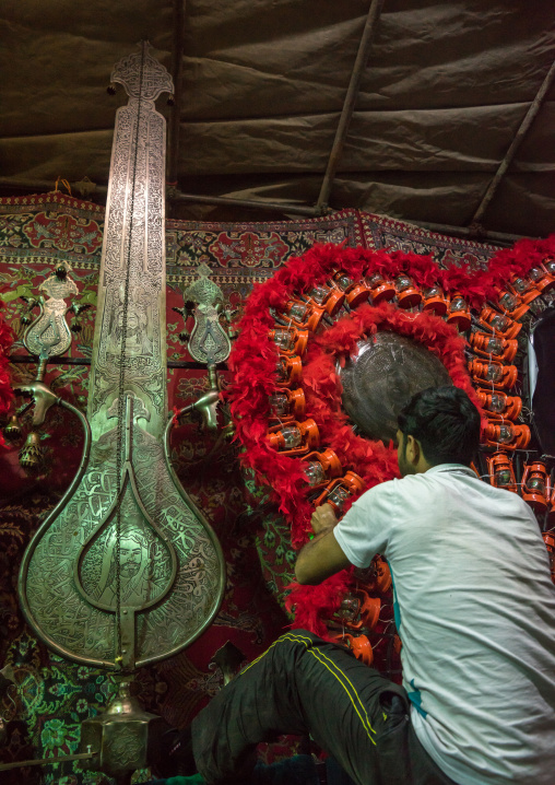Iranian Shiite Muslim Man Making An Alam On Ashura, The Day Of The Death Of Imam Hussein, Isfahan Province, Kashan, Iran