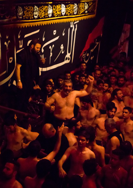 Iranian Shiite Muslim Mourners From The Mad Of Hussein Community Chanting And Self-flagellating During Muharram, Isfahan Province, Kashan, Iran