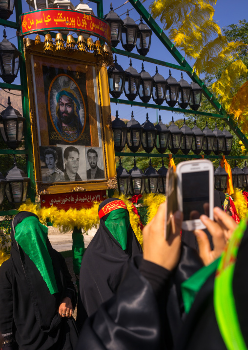 Woman Taking Pictures With A Mobile Phone Of Shiite Muslim Women Mourning Imam Hussein On The Day Of Tasua, Lorestan Province, Khorramabad, Iran