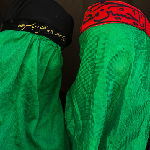 Iranian Shiite Muslim Women Mourning Imam Hussein On The Day Of Tasua With Their Faces Covered By A Green Veil, Lorestan Province, Khorramabad, Iran