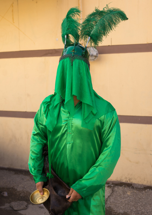 Iranian Man With Green Historic Costume During Chehel Menbari Festival On Tasua Day, Lorestan Province, Khorramabad, Iran