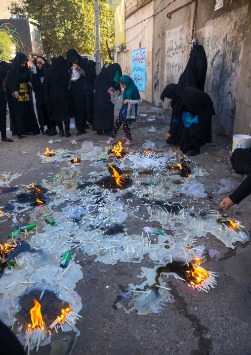 Iranian Women Light Candles During Chehel Menbari Festival On Tasua To Commemorate The Martyrdom Anniversary Of Hussein, Lorestan Province, Khorramabad, Iran