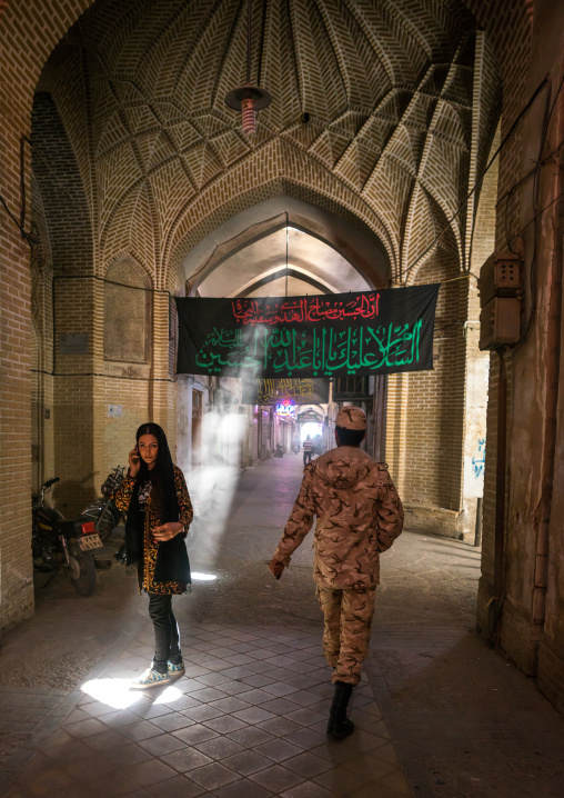 Woman And Soldier In An Empty Bazaar, Yazd Province, Yazd, Iran
