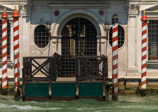 Old door on the canal, Veneto Region, Venice, Italy