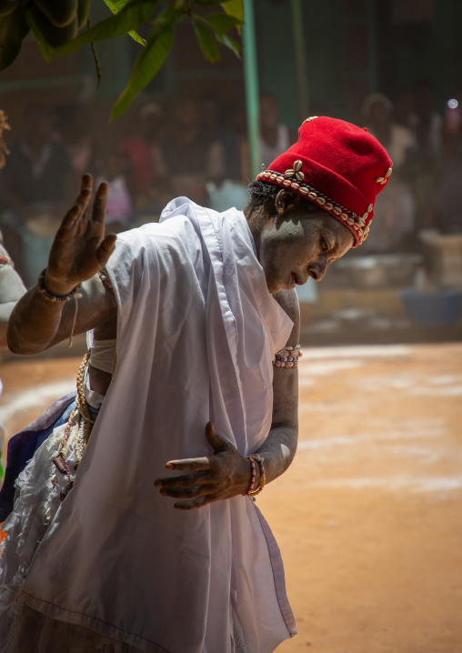 Komian woman dancing during a ceremony in Adjoua Messouma Komians initiation centre, Moyen-Comoé, Aniassue, Ivory Coast